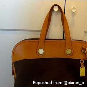 Dooney and Bourke tote bag. In a nice brown color